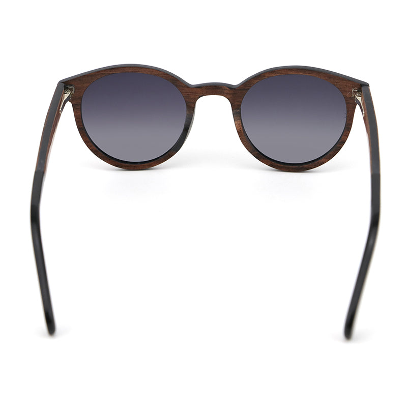 The AVELINE's round frames, crafted from laminated ebony wood, are perfect for small faces. Experience the elegance of a lightweight wooden frame while making a sustainable style statement.