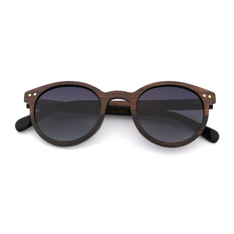 The AVELINE's round frames, crafted from laminated ebony wood, are perfect for small faces. Experience the elegance of a lightweight wooden frame while making a sustainable style statement.