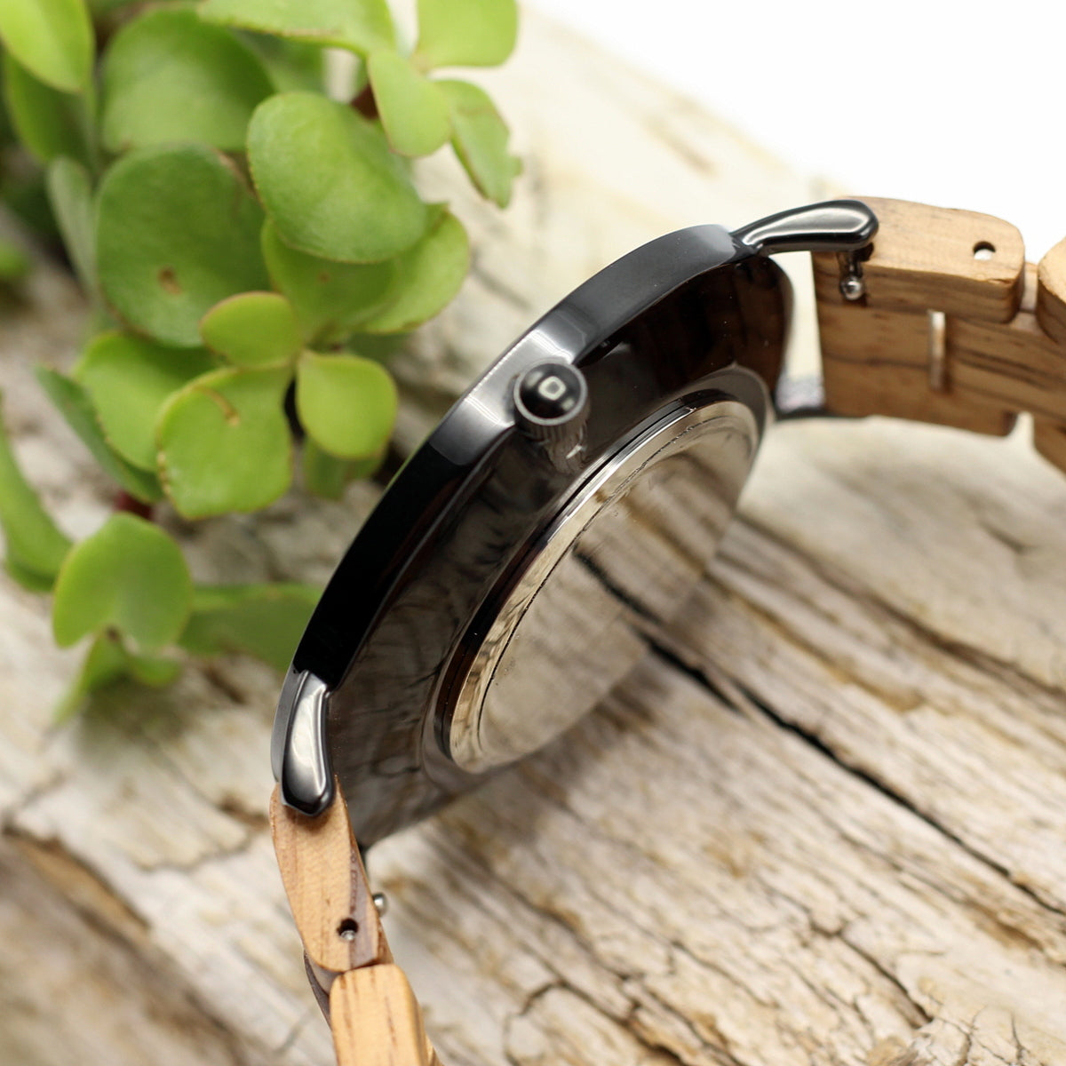 Men's modern stainless steel watch with zebra wood face and wooden strap. Thin, lightweight , eco-friendly and uber-trendy. Engrave a message on the back for R80. Shipping anywhere in SA for R59.