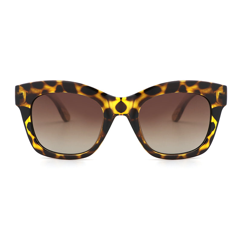 The Khloe Yellow TS frame with gradient brown polarized lens and zebrawood arms, exclusive to Hashtag Bamboo.