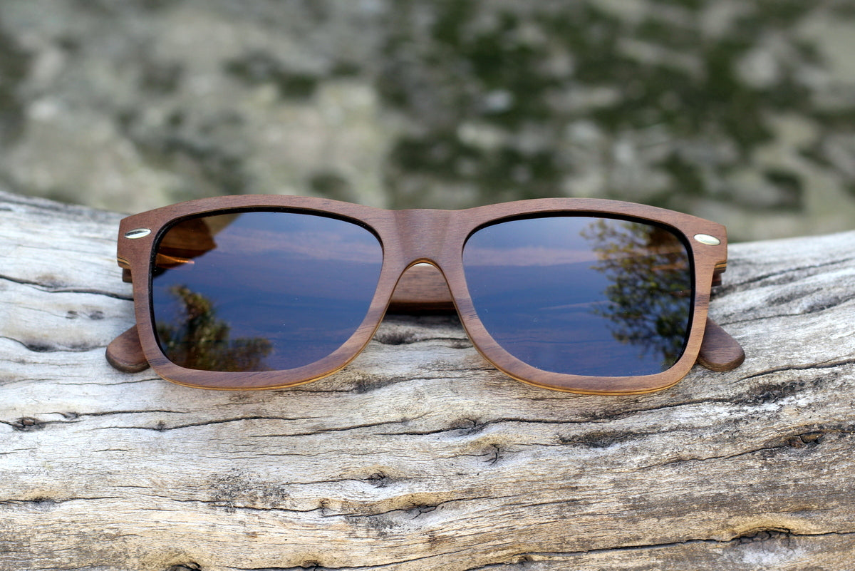 Mens solid wood ebony sunglasses with brown polarised lens, includes free case valued at R120. Personalise them for R60.