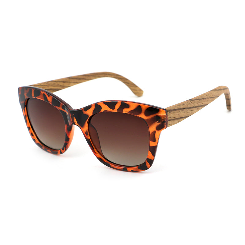 The Khloe Ladies oversize tortoise-shell frames with zebrawood arms and gradient brown polarized lens.