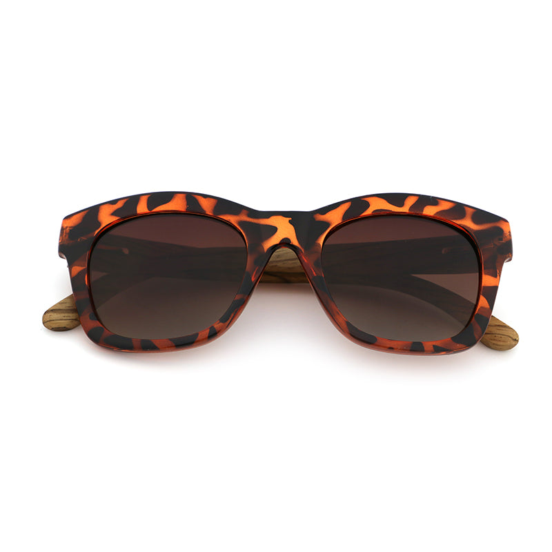 The Khloe Ladies oversize tortoise-shell frames with zebrawood arms and gradient brown polarized lens.