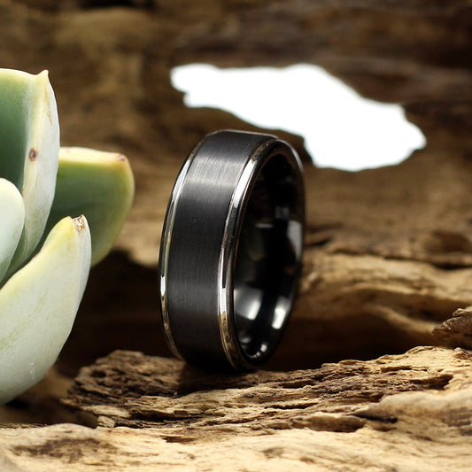 Men's black brushed tungsten ring 8mm wedding band with silver bevelled edges.