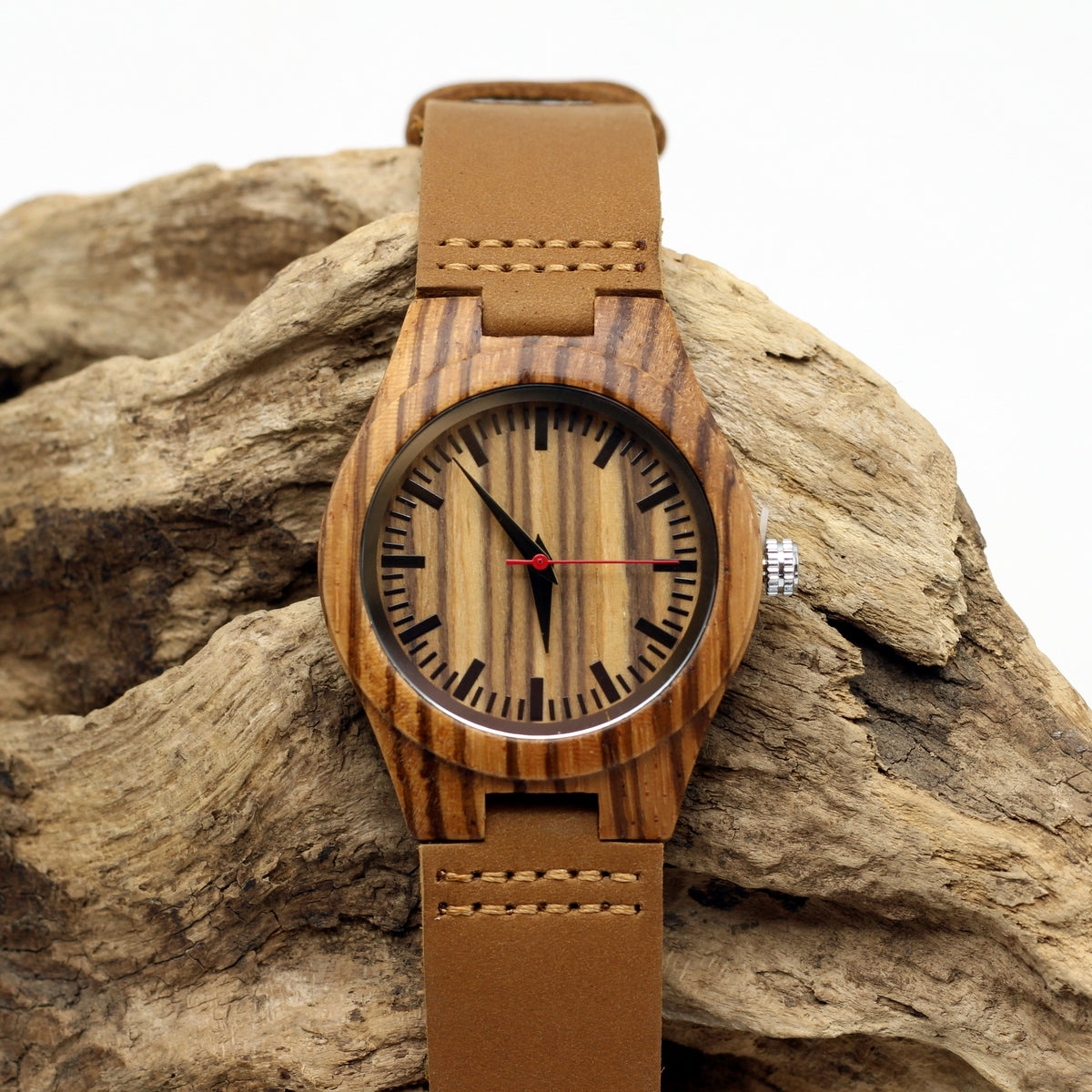 Ladies zebra wooden watch with genuine leather strap. The LADY ZEBRA, also available in a matching men's version. Engrave a message on the back for R100.