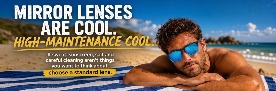 Man wearing blue mirrored polarised sunglasses on the beach – Hashtag Bamboo mirror lens care guide