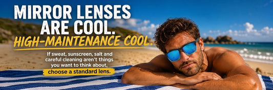 Man wearing blue mirrored polarised sunglasses on the beach – Hashtag Bamboo mirror lens care guide