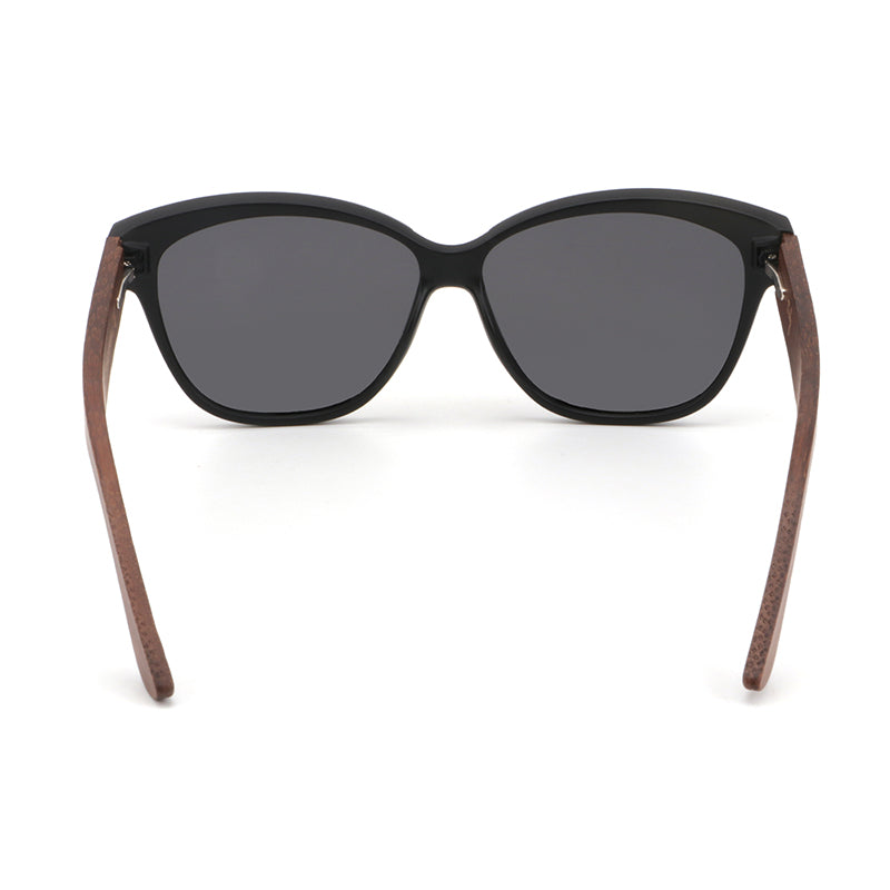 Hashtag Bamboo's NAOMI ladies sunglasses, featuring a slight cat-eye, matt black frame, polarized lens and gorgeous hand-stained dark bamboo arms.