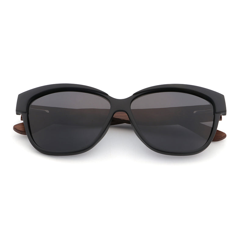 Hashtag Bamboo's NAOMI ladies sunglasses, featuring a slight cat-eye, matt black frame, polarized lens and gorgeous hand-stained dark bamboo arms.