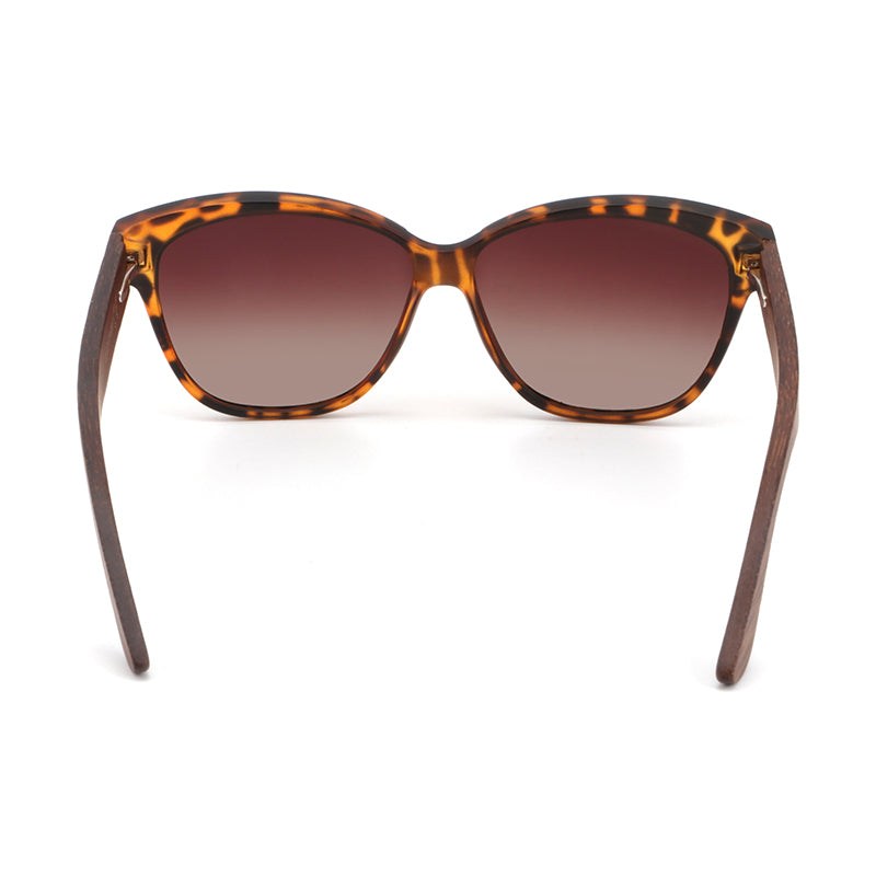 Hashtag Bamboo's NAOMI ladies sunglasses, featuring a slight cat-eye, tortoise-shell frame, polarized gradient brown lens and gorgeous hand-stained dark bamboo arms.