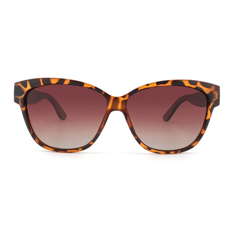 Hashtag Bamboo's NAOMI ladies sunglasses, featuring a slight cat-eye, tortoise-shell frame, polarized gradient brown lens and gorgeous hand-stained dark bamboo arms.