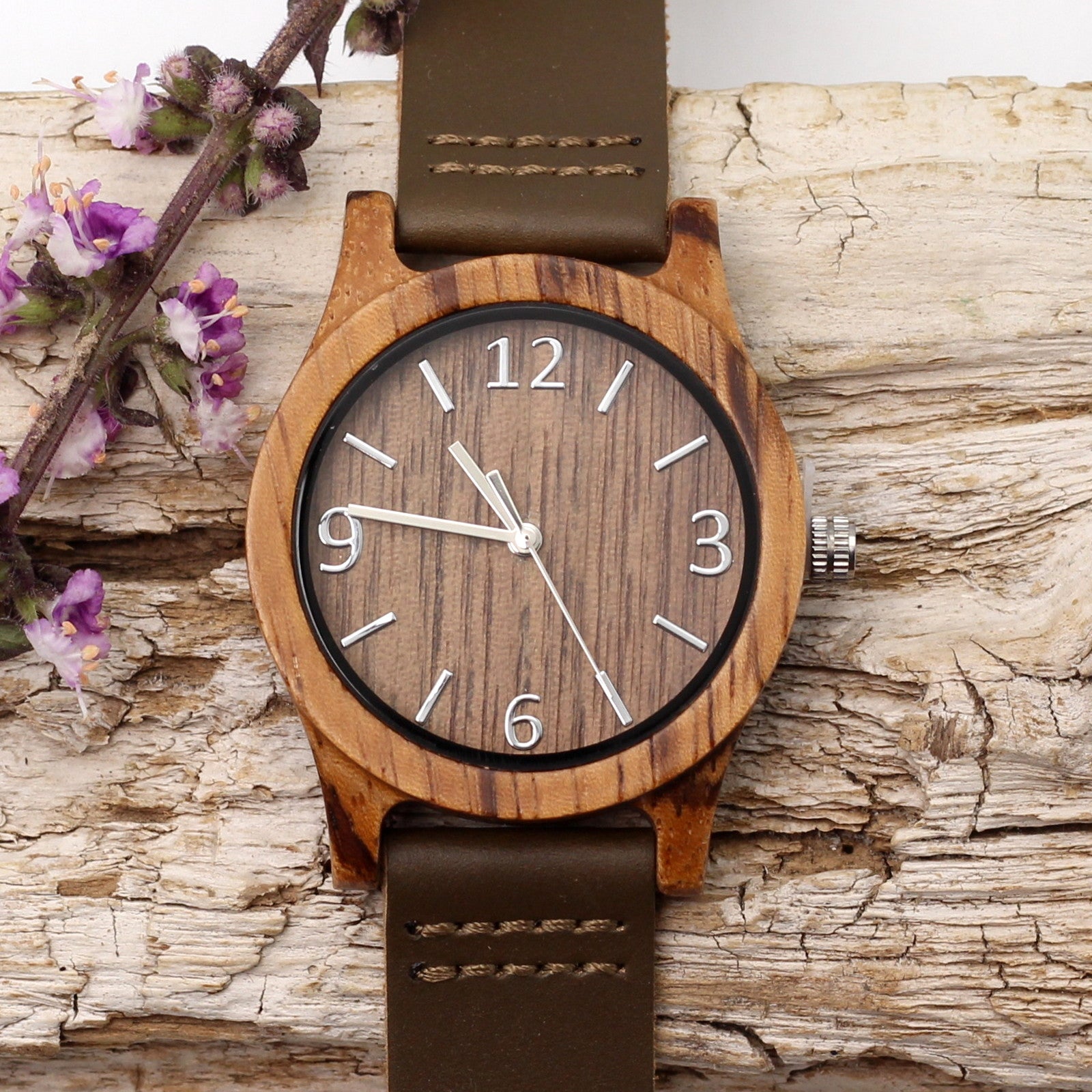 Ladies wooden watch, the Cara Silver, featuring a zebra wood case with silver dials and brown leather strap, personalise it for only R100. Hashtag Bamboo, South Africa.