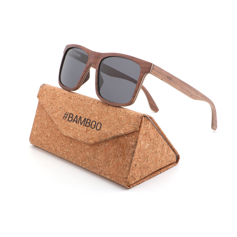 Linden men's brown wooden sunglasses with dark grey polarised lenses on a branded Hashtag Bamboo cork case.