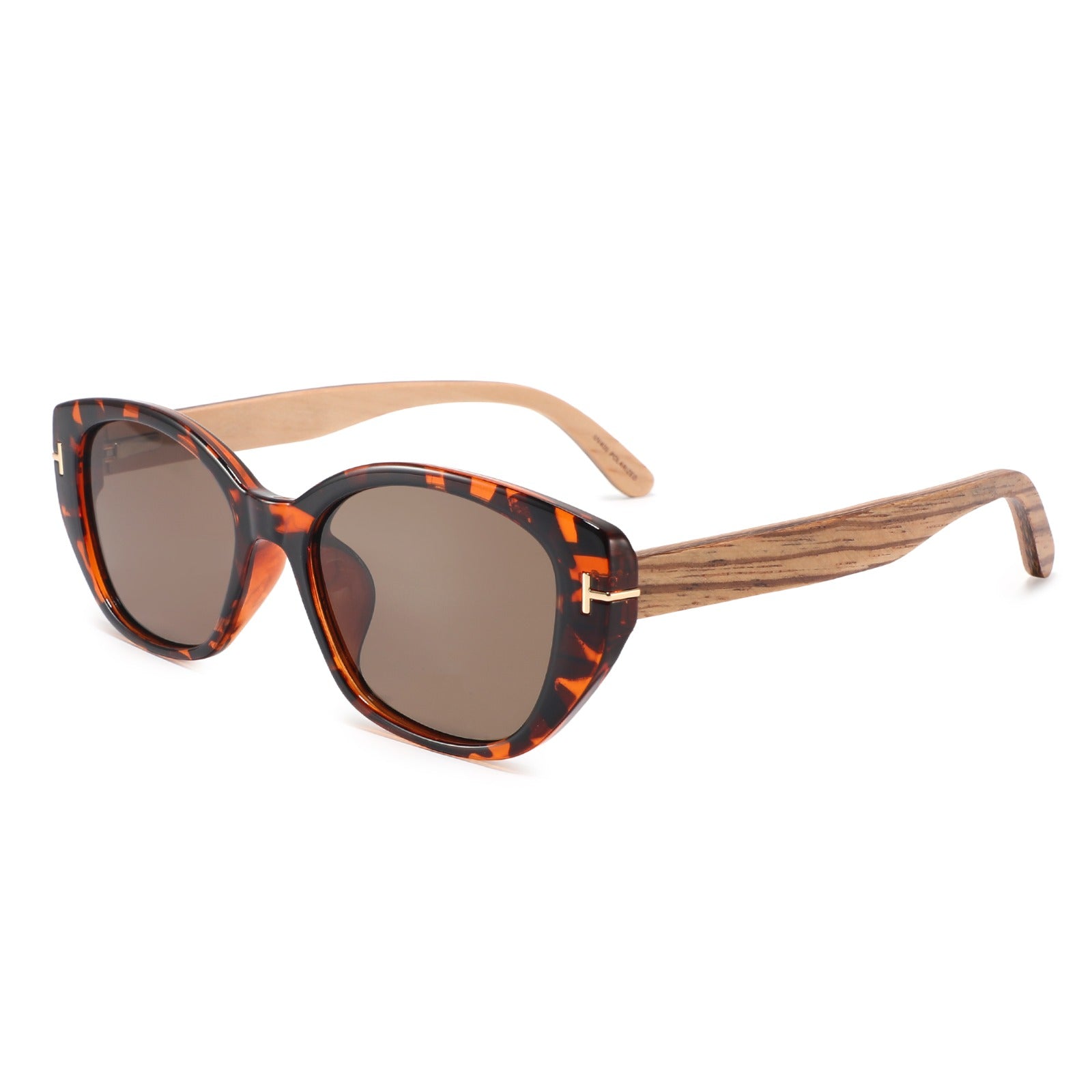 Cat-eye sunglasses with a tortoiseshell polycarbonate frame, zebrawood natural wood temples, and brown tinted lenses, shown on a plain white background.