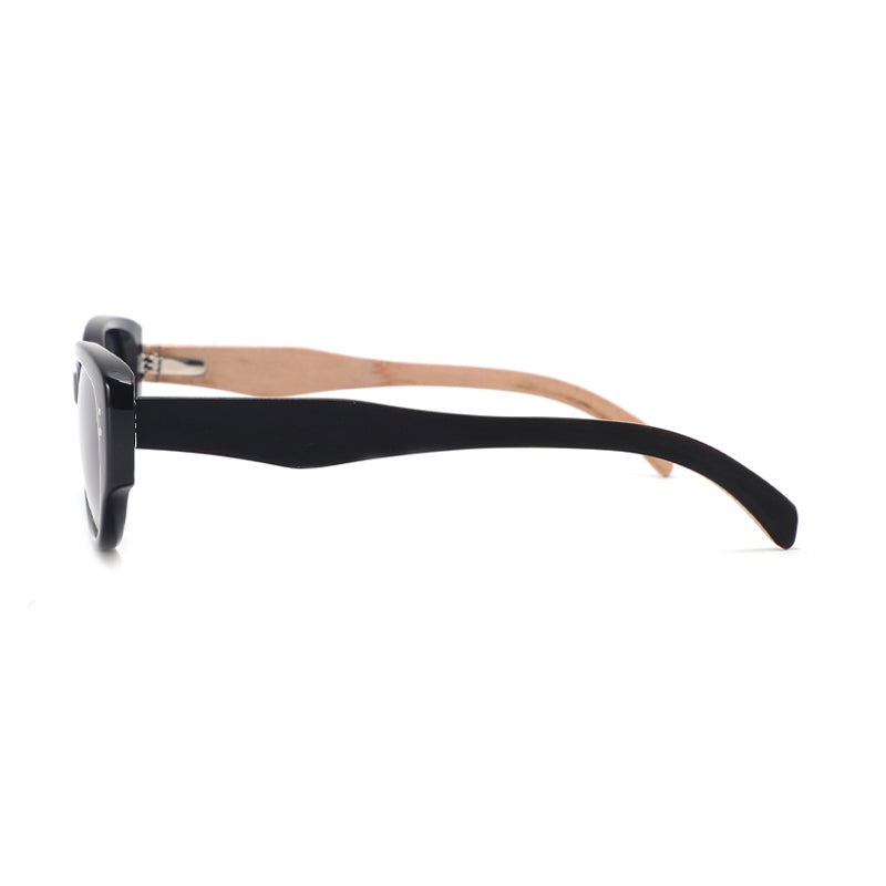 Zadie ladies polarised sunglasses with natural wood arms in black, brown, green and grey. Side view.