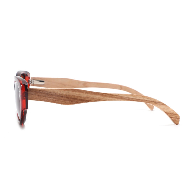 Side view of a pair of sunglasses with a reddish-brown acetate frame and natural wood arms on a white background.