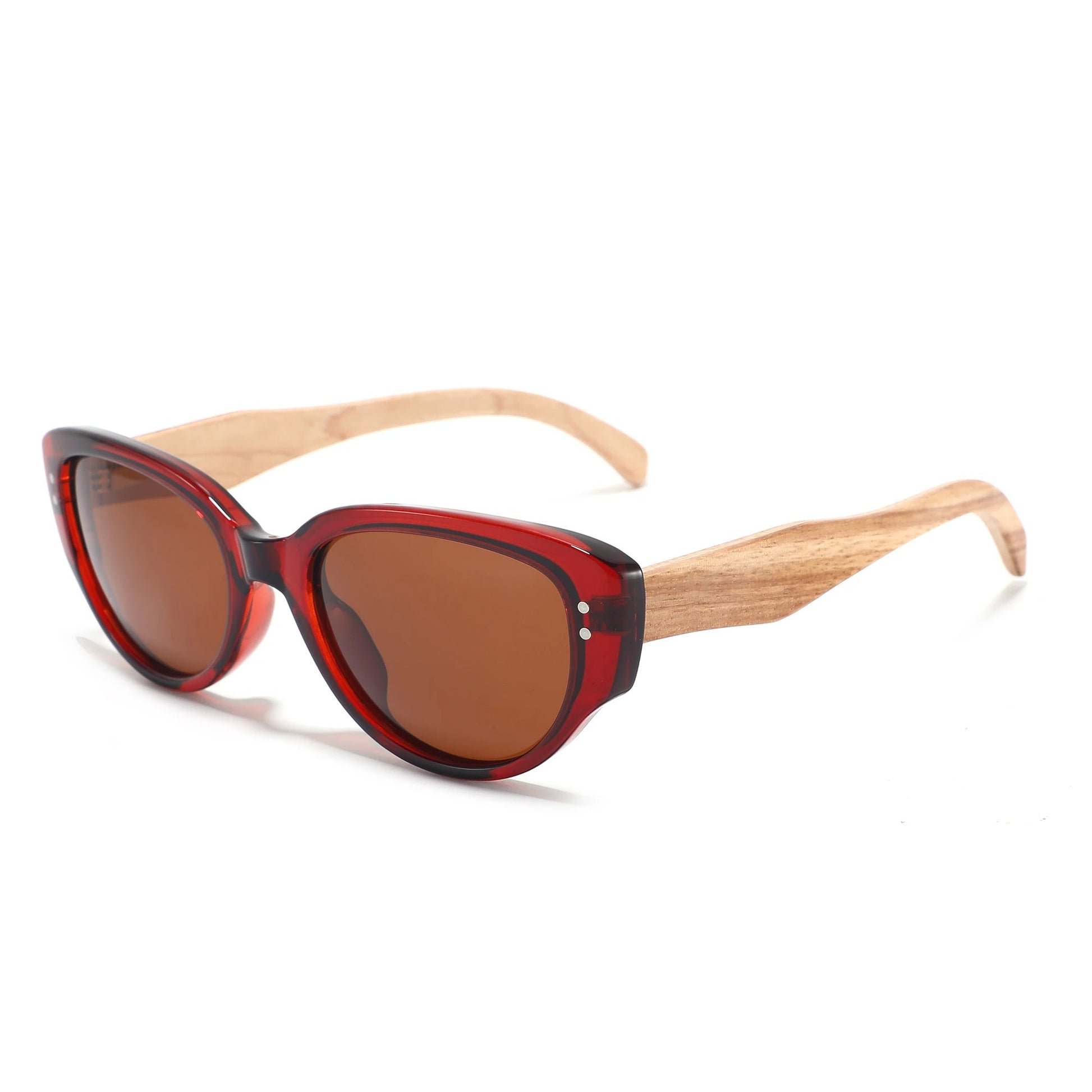 Cat-eye sunglasses with translucent rusty brown frame, brown lenses, and light natural wood temples, shown on a white background.