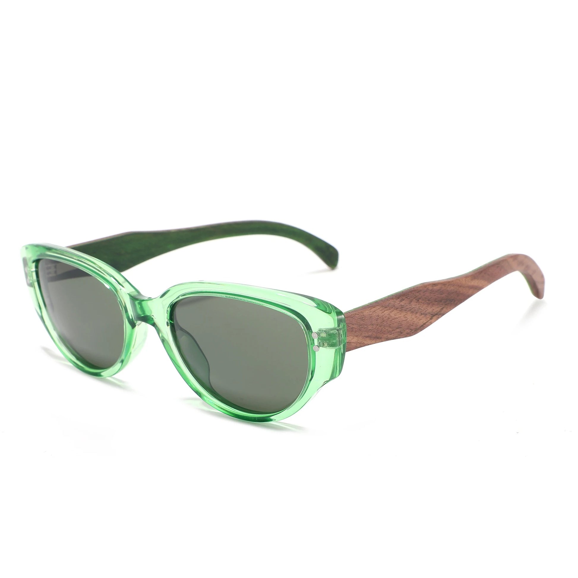 Cat-eye sunglasses with translucent mint green frames, dark green lenses, and natural wood temples on a white background.