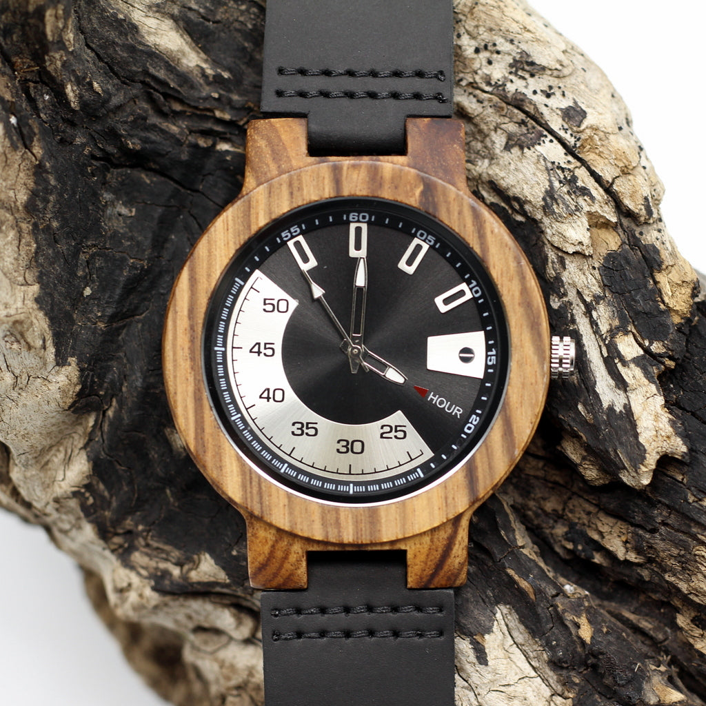 Men's zebra wood wooden watch with modern silver dials and black leather strap. Engrave a message on the back for only R100.