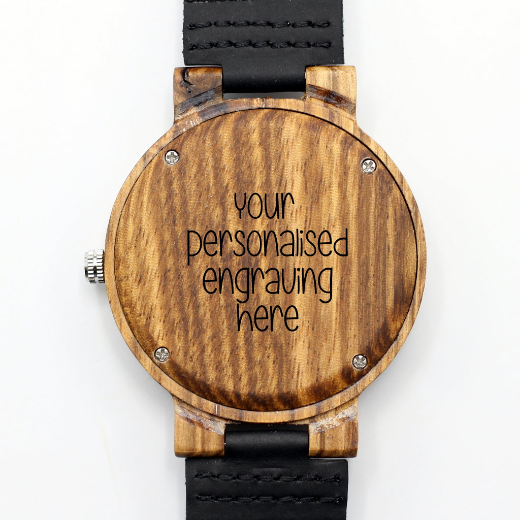 Men's zebra wood wooden watch with modern silver dials and black leather strap. Engrave a message on the back for only R100.