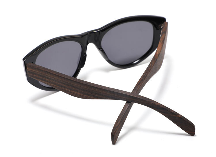Ladies black sunglasses with grey polarized lens and ebony wooden arms by Hashtag Bamboo.