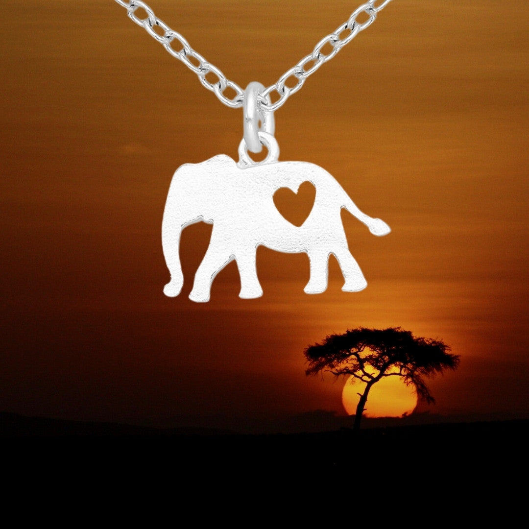 925 sterling silver african elephant pendant with heart cut-out. We love Africa, wildlife charm with chain optional extra.