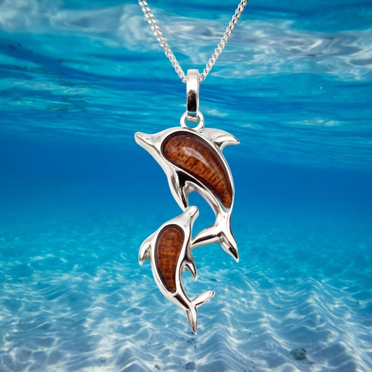 925 Silver dolphin pendant with wood inlay. Buy the pendant alone or with a 40cm silver chain.