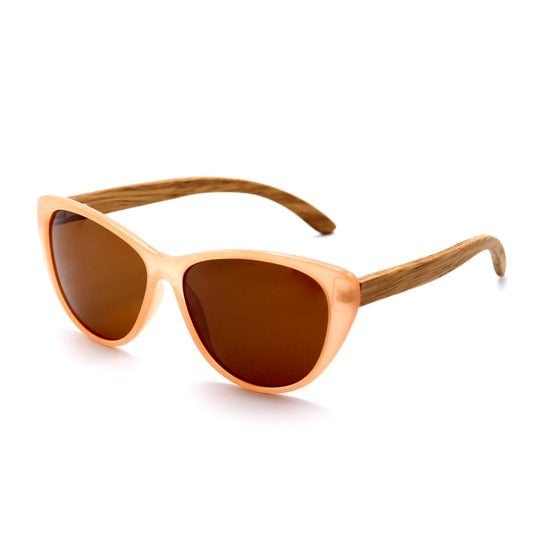 The new, oh-so-flattering Callies in oh-so-trendy pastel nude frame with polarized brown lens and zebrawood wooden arms.