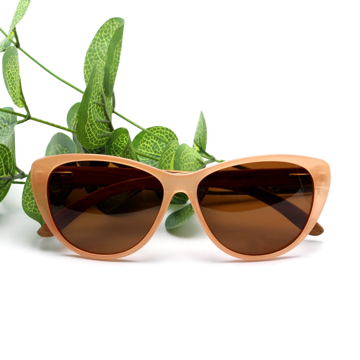 The new, oh-so-flattering Callies in oh-so-trendy pastel nude frame with polarized brown lens and zebrawood wooden arms.