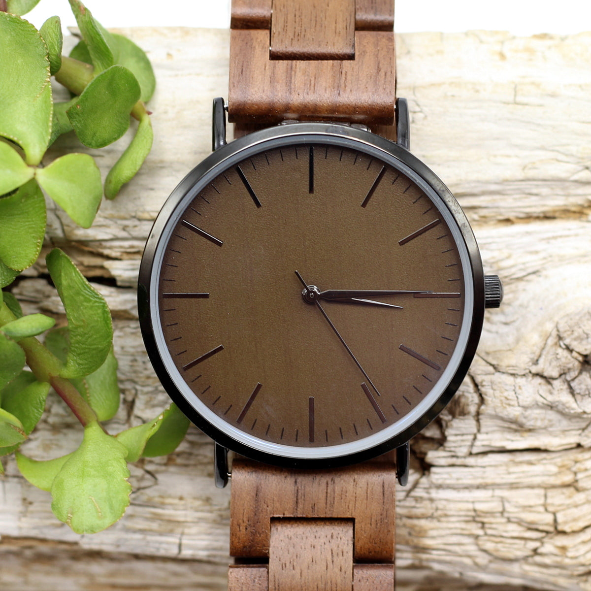 Men's stainless steel watch with walnut wood face and solid wood strap. The Emporio, a modern watch with an eco-friendly feel. Lightweight, ultraslim and uber-trendy. Personalise the back for only R80. Shipping anywhere in SA for R59.