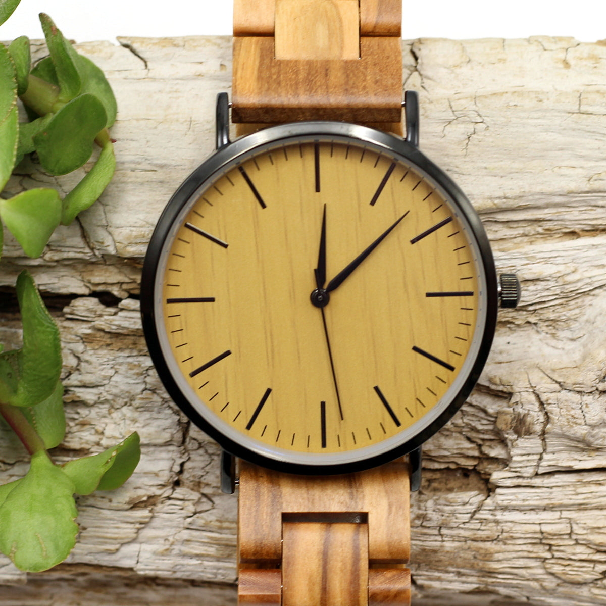 Men's modern stainless steel watch with olive wood face and wooden strap. Thin, lightweight , eco-friendly and uber-trendy. Engrave a message on the back for R80. Shipping anywhere in SA for R59.