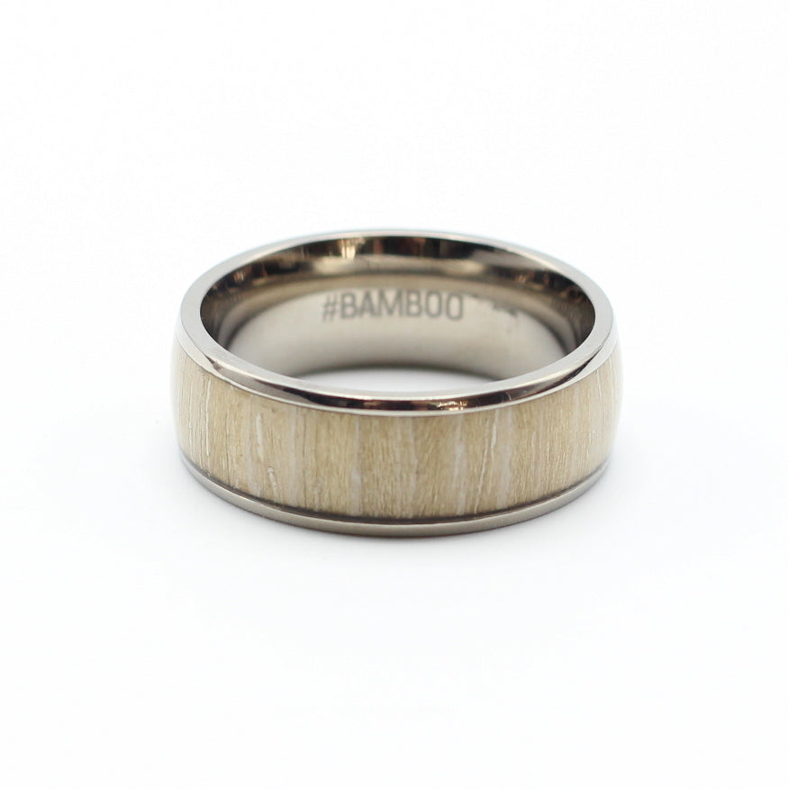 Mens wedding band, titanium ring with wild olive inlay, hashtag bamboo, orbit.