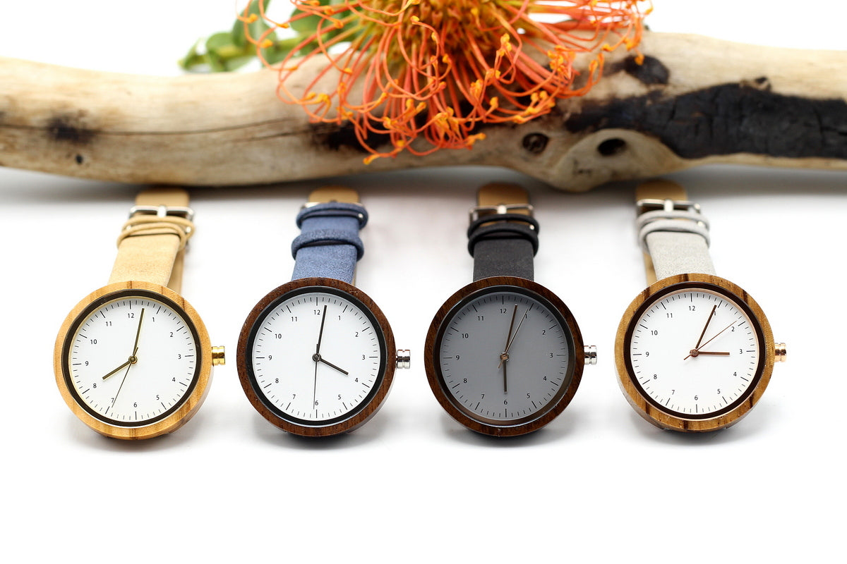 Kanso CUTIE Round Petite Wooden Watch ebony wood with vegan leather black strap, make it personal and engrave a message on the back. Shipping only R59.