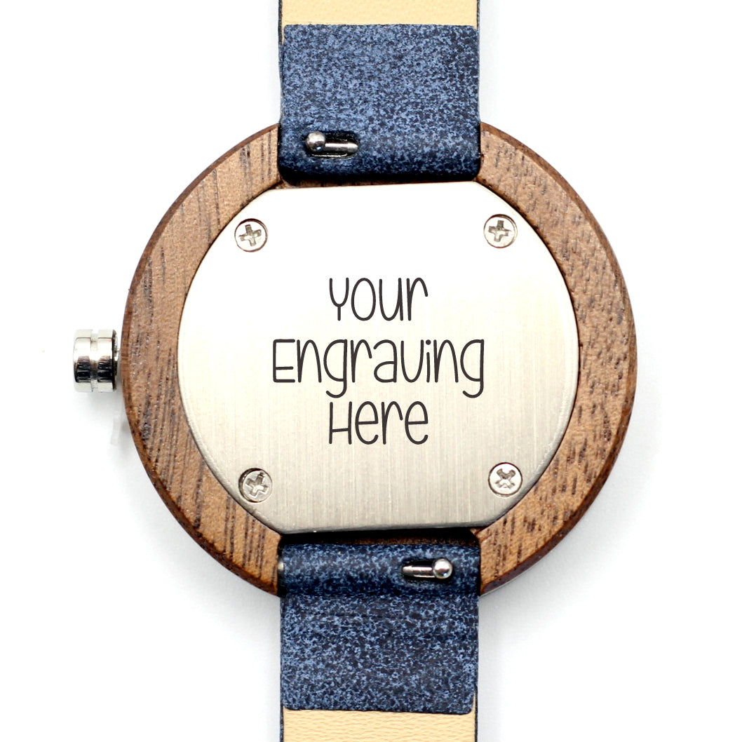 Kanso CUTIE Round Petite Wooden Watch ebony wood with vegan leather blue strap, make it personal and engrave a message on the back. Shipping only R59.