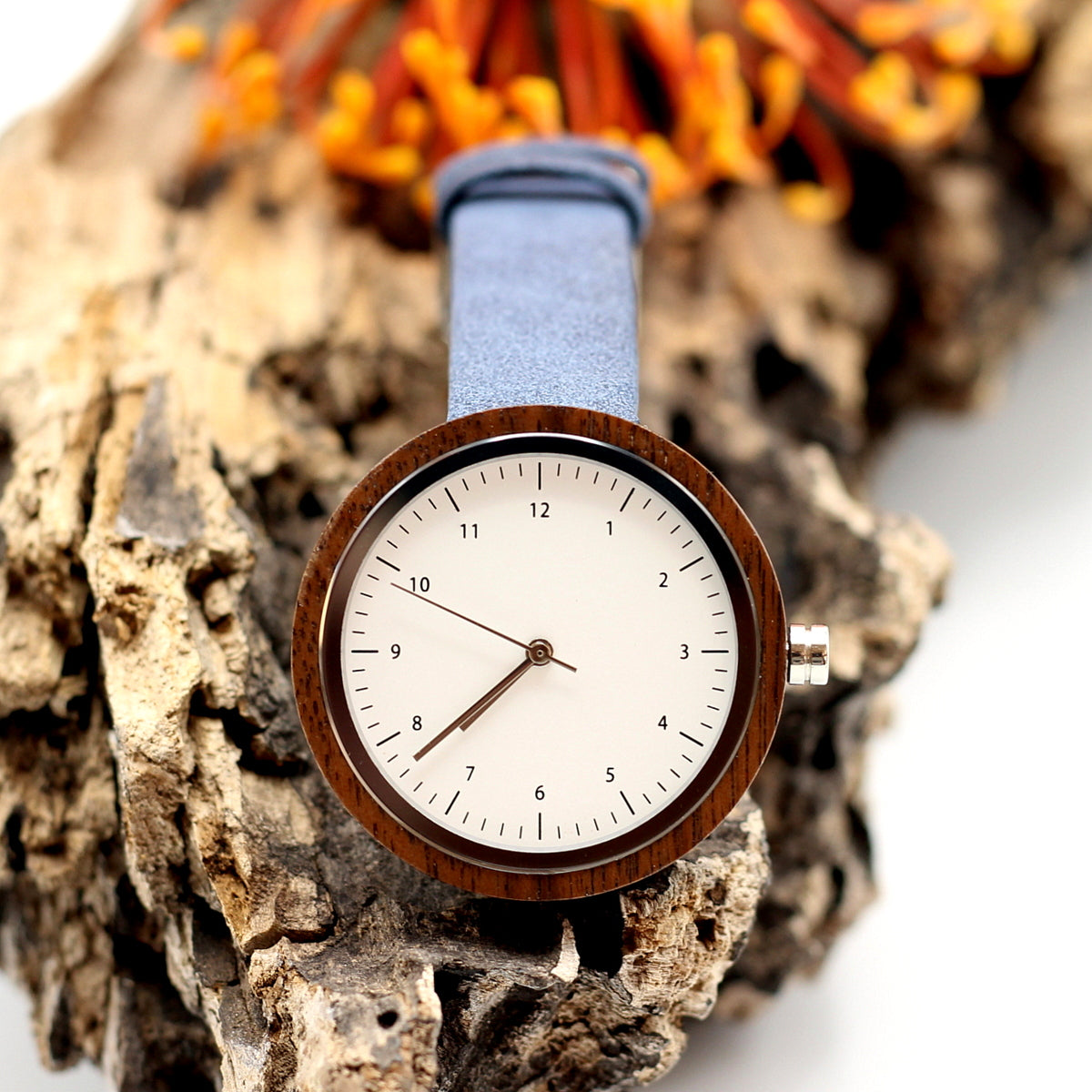 Kanso CUTIE Round Petite Wooden Watch ebony wood with vegan leather blue strap, make it personal and engrave a message on the back. Shipping only R59.