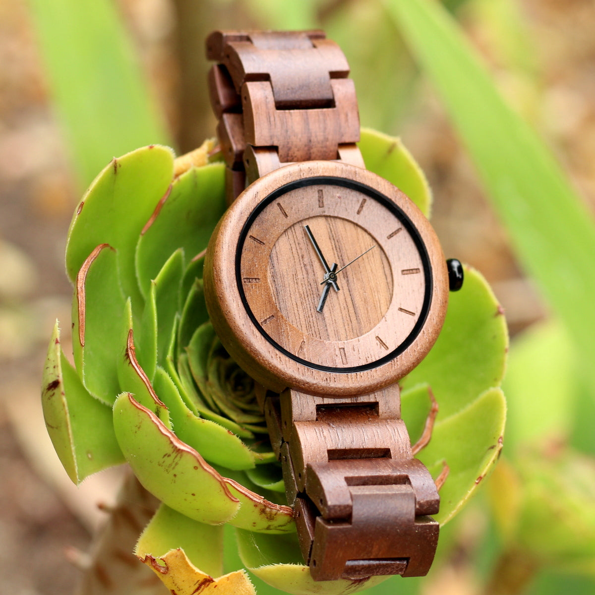 Our ECO-BEAN unisex wooden watch, walnut watch face and matching strap, 39mm, lightweight and stylish. Engrave a short message on the back for R80.