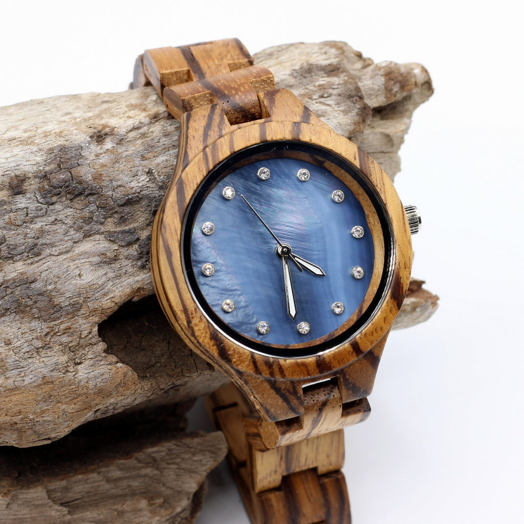 Ladies zebra wood wooden watch with blue opalescent face and diamante dials. Engrave a personal message on the back for R100. Fast delivery.