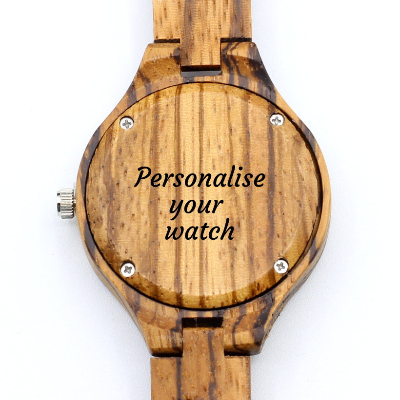Ladies zebra wood wooden watch with blue opalescent face and diamante dials. Engrave a personal message on the back for R100. Fast delivery.