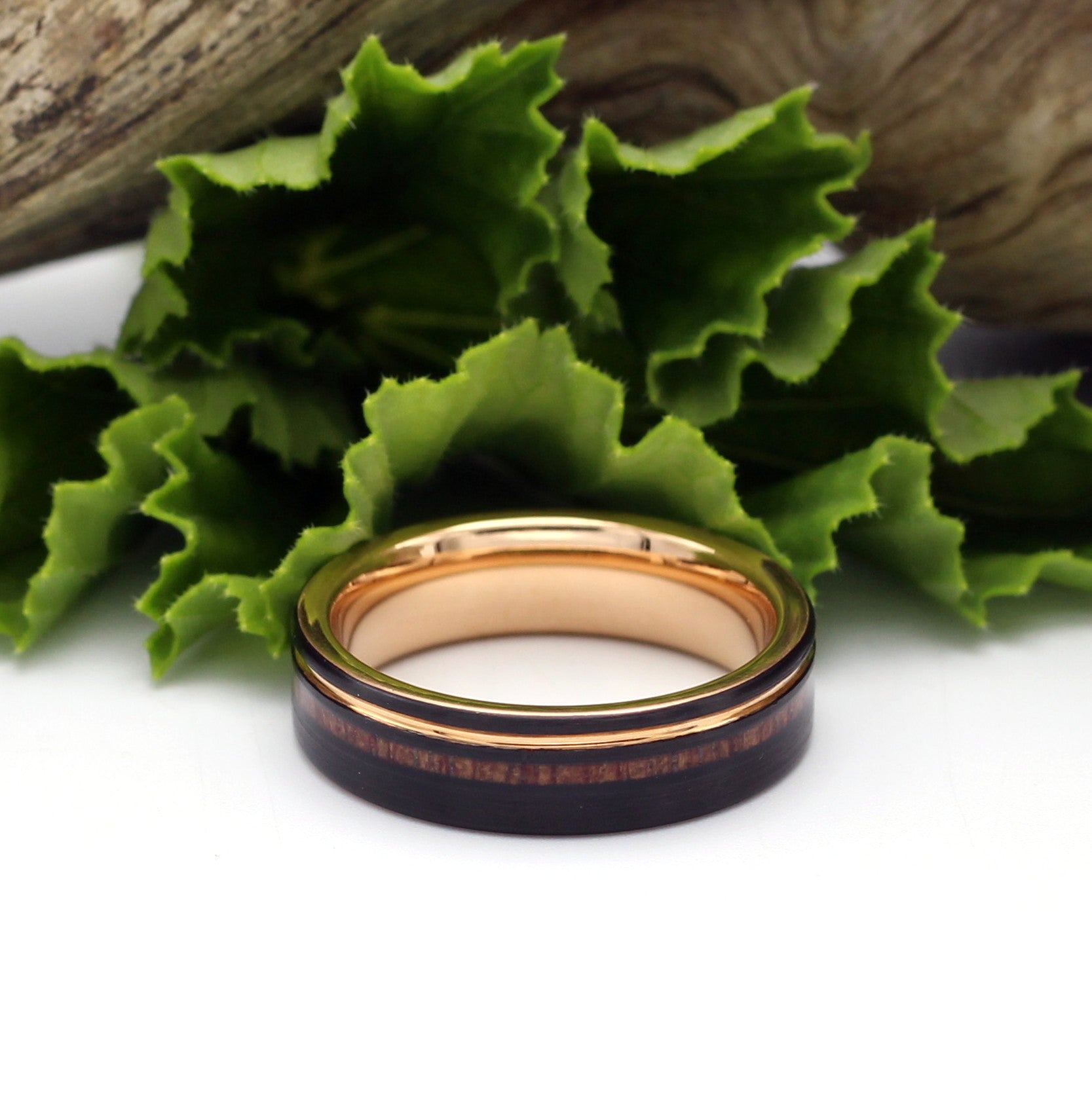 Men's black tungsten 6mm ring with wood inlay and rose gold band. Hashtag Bamboo, orbit rings, NYJ we've got them covered. Engrave your ring.