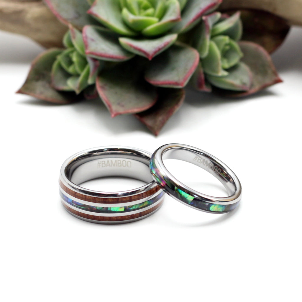 Silver tungsten rings, matching couples rings, shell and koa wood inlay. Hashtag Bamboo South Africa.